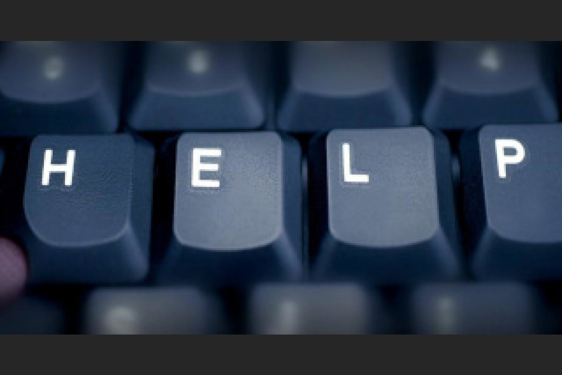 Computer keys that spell the word help.